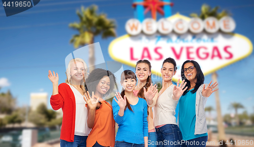 Image of international group of happy women at las vegas