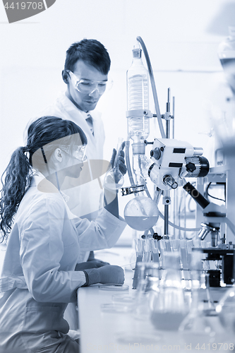 Image of Young chemists researching in life science laboratory.