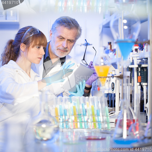 Image of Health care professionals researching in scientific laboratory.