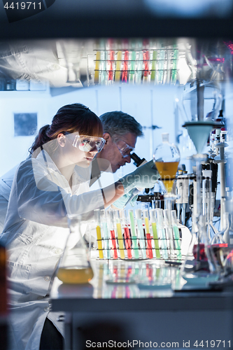 Image of Health care researchers working in scientific laboratory.