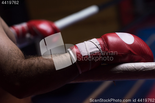 Image of kick boxer with a focus on the gloves