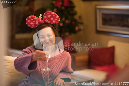 Image of woman drinking champagne at spa