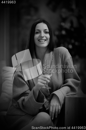 Image of woman drinking champagne at spa