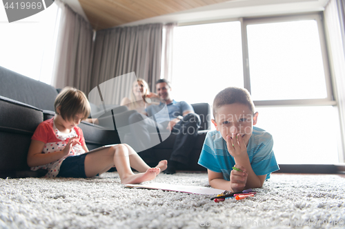 Image of young couple spending time with kids