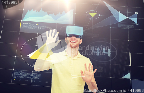 Image of happy man in virtual reality headset or 3d glasses