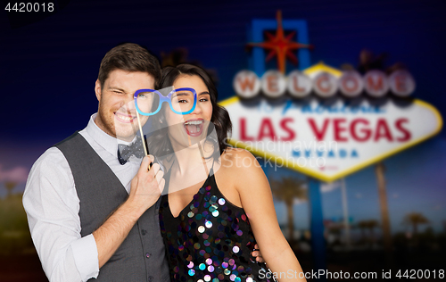 Image of couple with party glasses having fun at las vegas