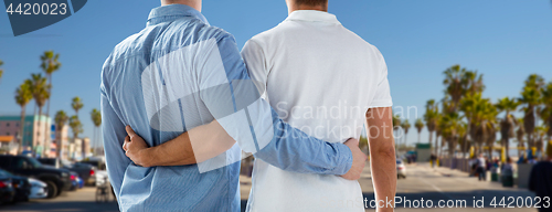 Image of close up of gay couple hugging over los angeles