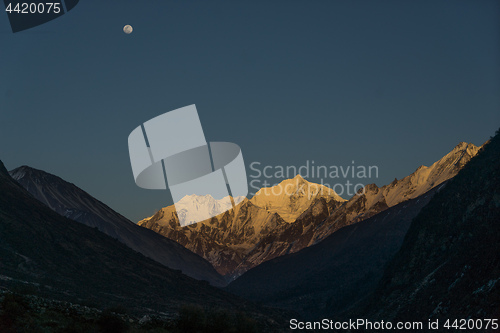 Image of Langtang valley moonrise over mountain