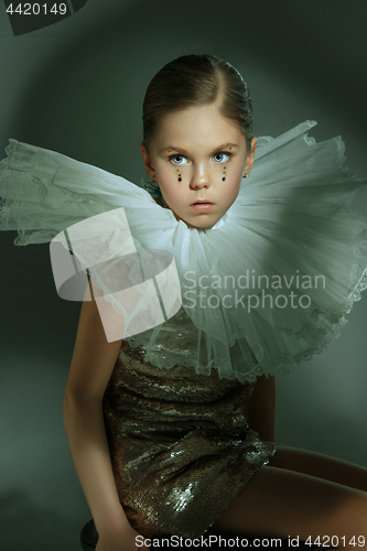 Image of The fashion portrait of young beautiful teen girl at studio