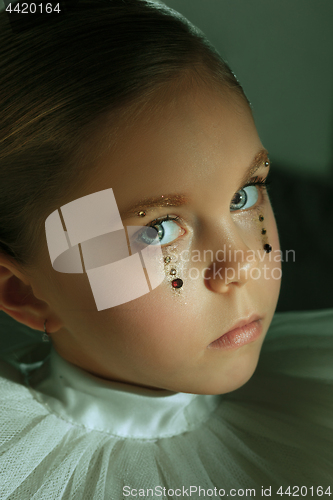 Image of The fashion portrait of young beautiful teen girl at studio