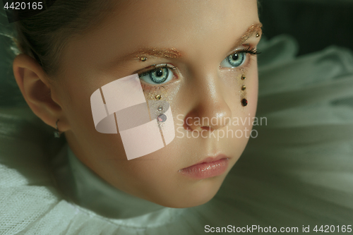 Image of The fashion portrait of young beautiful teen girl at studio