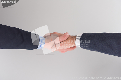 Image of cloasing the deal in modern office interior top view