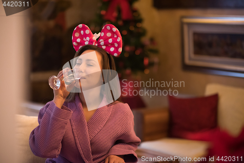 Image of woman drinking champagne at spa