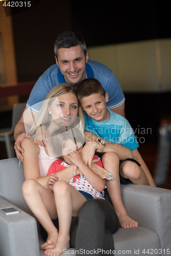 Image of couple spending time with kids