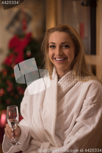 Image of woman drinking champagne at spa