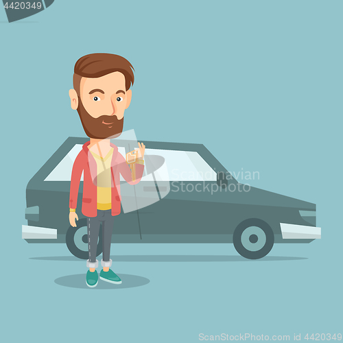 Image of Man holding keys to his new car.