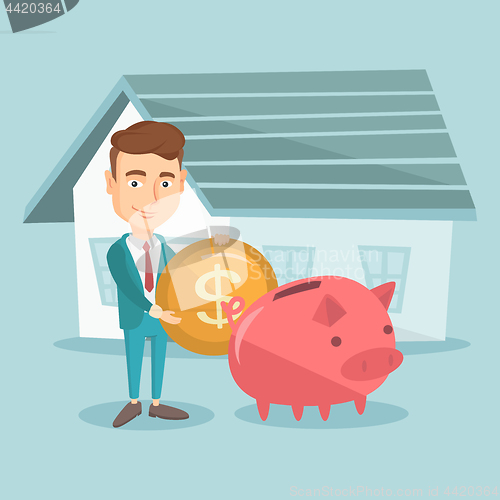 Image of Man puts money into piggy bank for buying house.