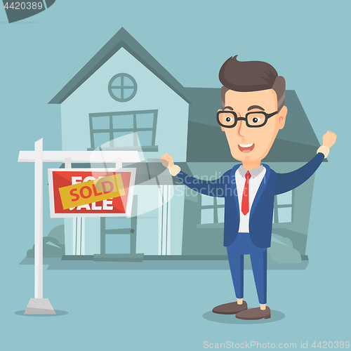 Image of Real estate agent with sold placard.