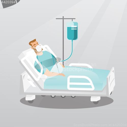 Image of Patient lying in hospital bed with oxygen mask.