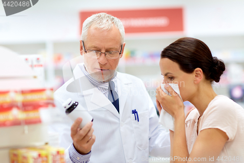 Image of apothecary and sick customer at pharmacy