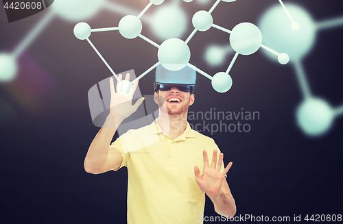 Image of happy man in virtual reality headset or 3d glasses