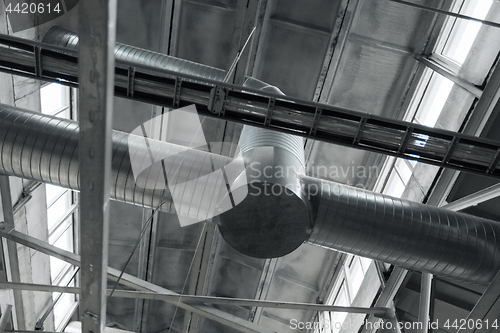 Image of ventilation pipes at factory shop