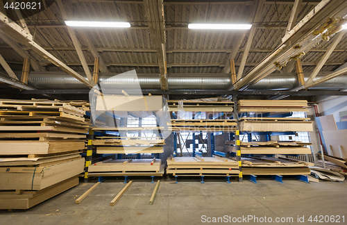 Image of boards storing at woodworking factory warehouse