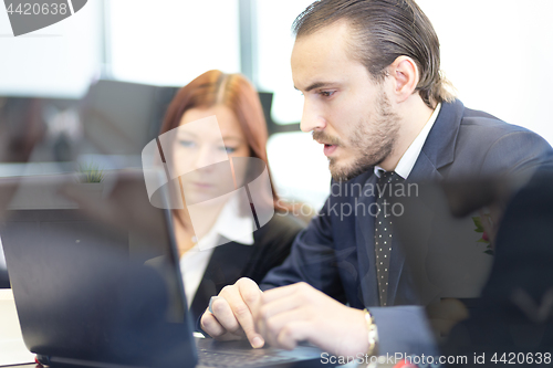 Image of Business people in modern office.