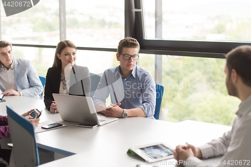 Image of Business Team At A Meeting at modern office building