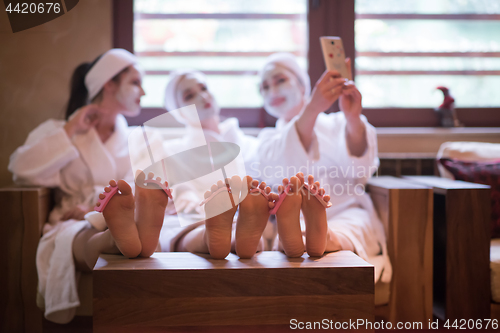 Image of group of famale friends in spa