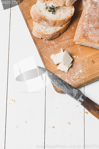 Image of The fresh bread on a white table background