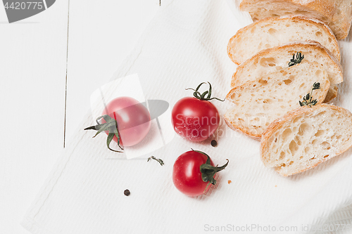 Image of The fresh bread on a white table background