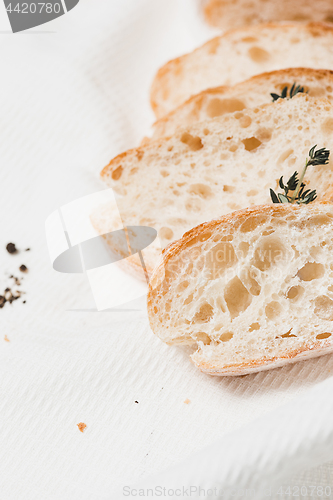 Image of The fresh bread on a white table background