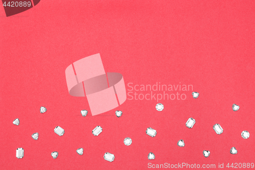 Image of Precious stones on pink background