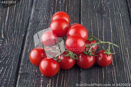 Image of Two branches of cherry tomatoes