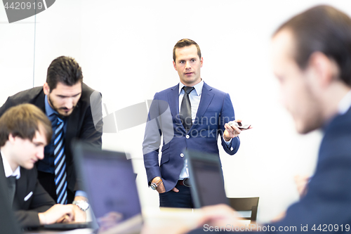 Image of Corporate business team office meeting.