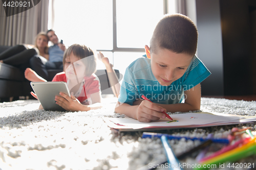 Image of young couple spending time with kids