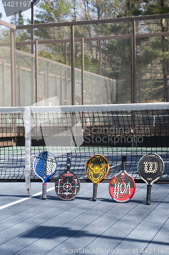 Image of editorial platform tennis court with paddles