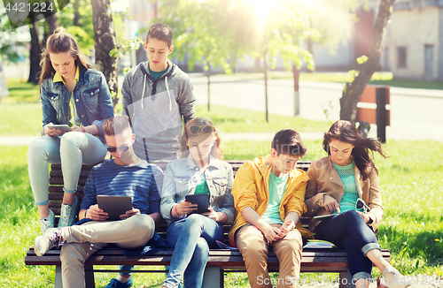 Image of group of students with tablet pc at school yard