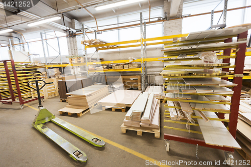 Image of boards storing at woodworking factory warehouse