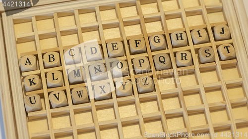 Image of wooden dice alphabet