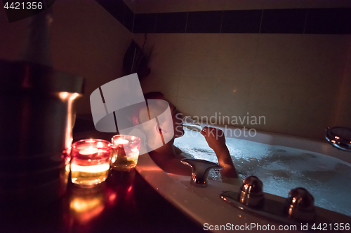 Image of man relaxing in the jacuzzi