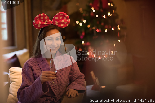 Image of woman drinking champagne at spa