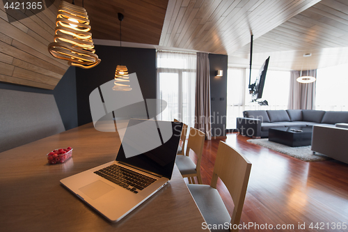 Image of Notebook with blank screen on table