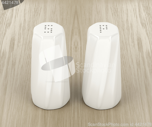 Image of White porcelain salt and pepper shakers