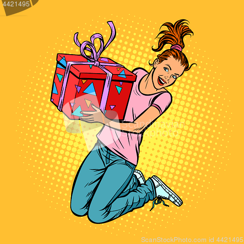 Image of teen girl with a gift jump of joy