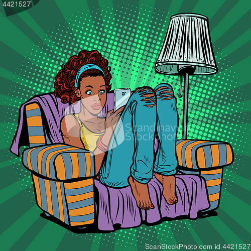 Image of Woman with phone in chair