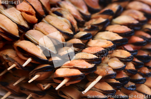 Image of Fried mussels on skewers 