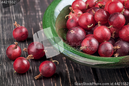 Image of Closeup of red gooseberry in bowl