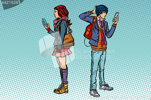 Image of Young man and girl. Teen couple with smartphones